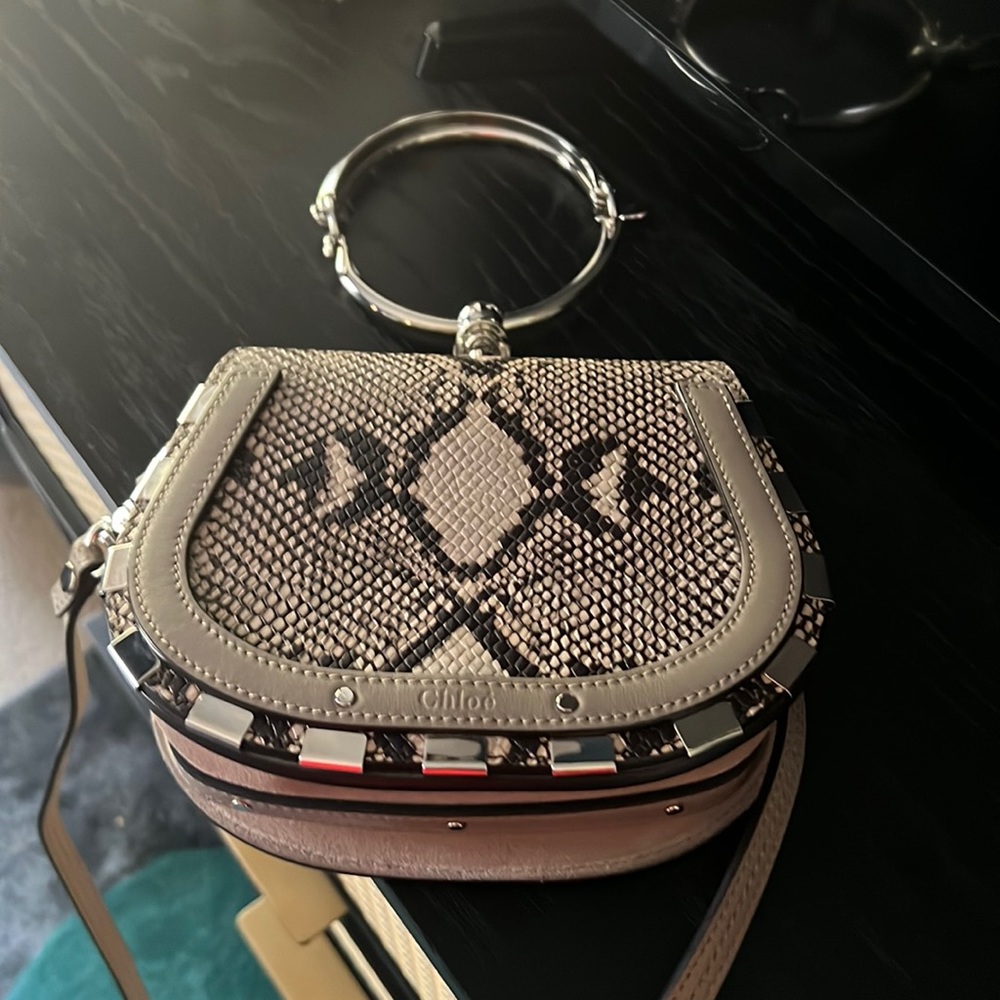 Chloe bracelet bag with python. Never been carried. Excellent condition.